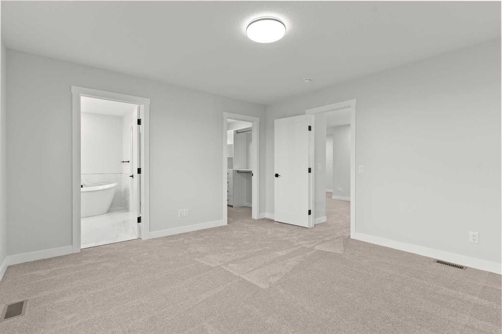 463 Kinniburgh Loop, Chestermere, AB - Indoor Photo Showing Other Room