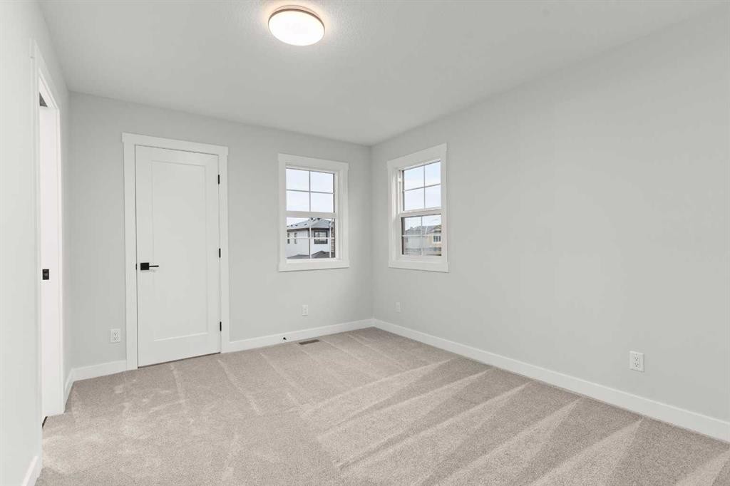 463 Kinniburgh Loop, Chestermere, AB - Indoor Photo Showing Other Room