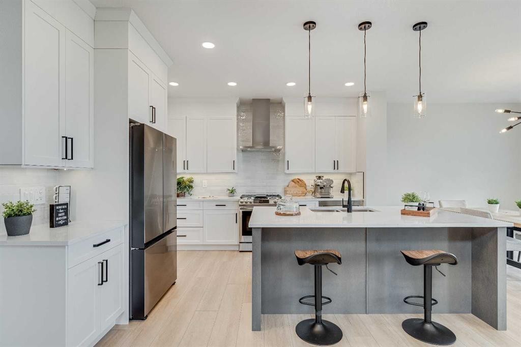 463 Kinniburgh Loop, Chestermere, AB - Indoor Photo Showing Kitchen With Stainless Steel Kitchen With Upgraded Kitchen