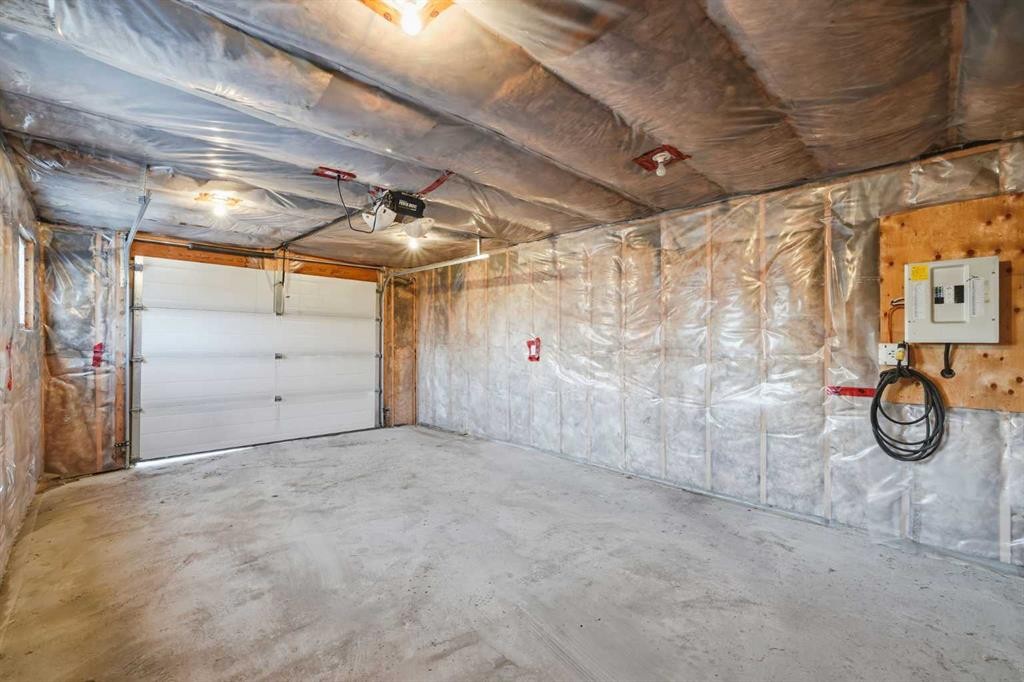 16280 5 Street Sw, Calgary, AB - Indoor Photo Showing Garage