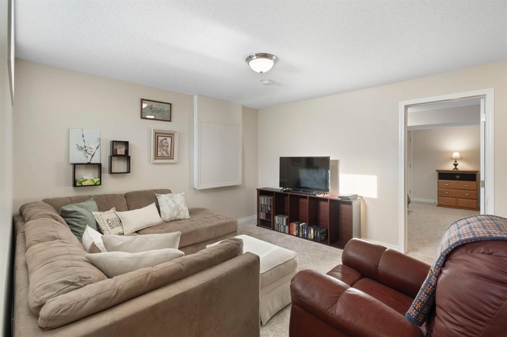 209 Hawkstone Drive Nw, Calgary, AB - Indoor Photo Showing Living Room
