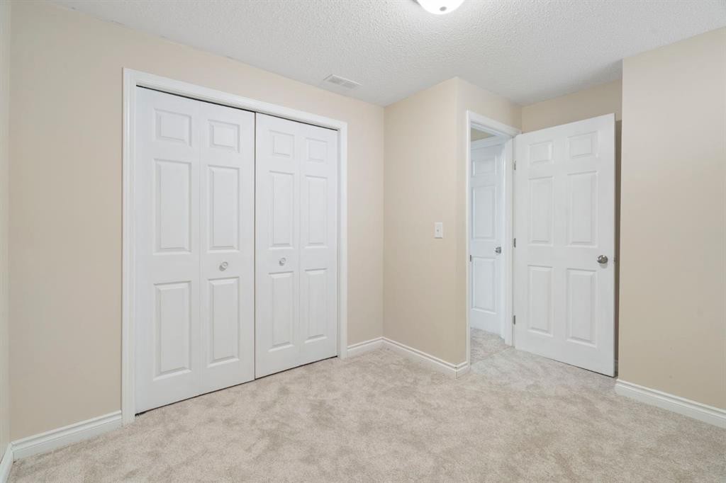 209 Hawkstone Drive Nw, Calgary, AB - Indoor Photo Showing Other Room