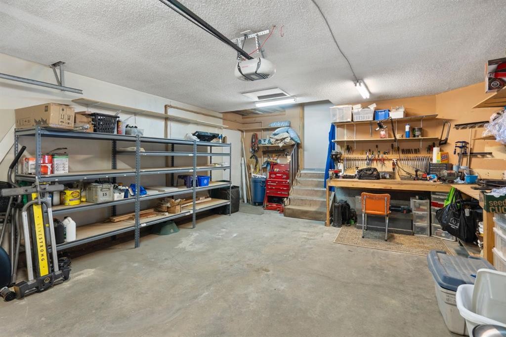 209 Hawkstone Drive Nw, Calgary, AB - Indoor Photo Showing Garage