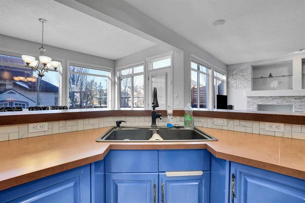 74 Cranleigh Green Se, Calgary, AB - Indoor Photo Showing Kitchen With Double Sink