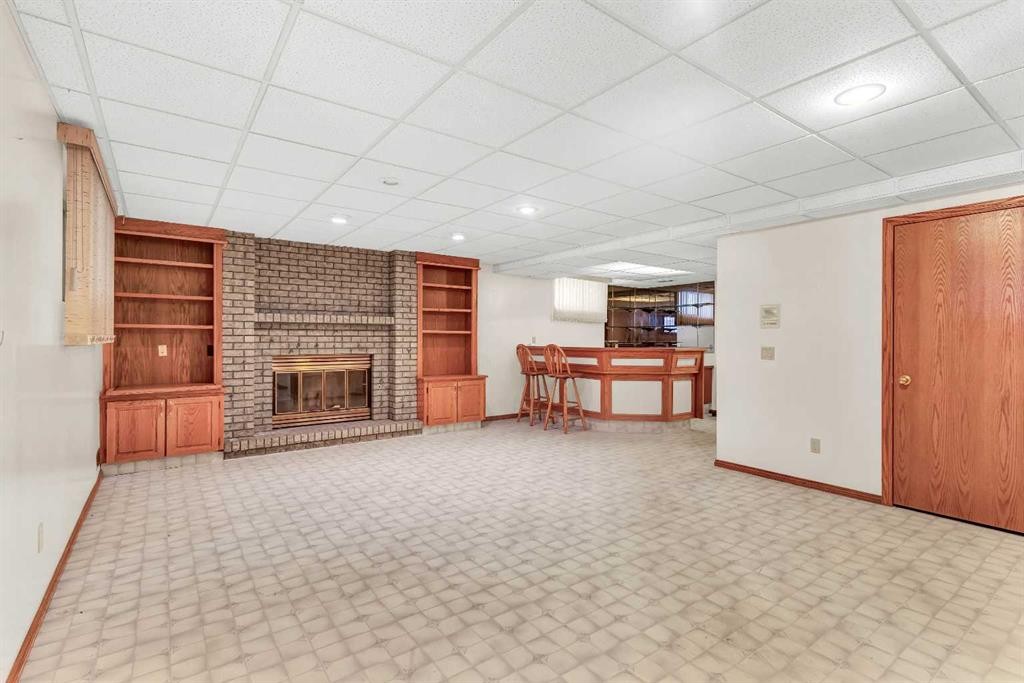 125 Edgebrook Road Nw, Calgary, AB - Indoor With Fireplace