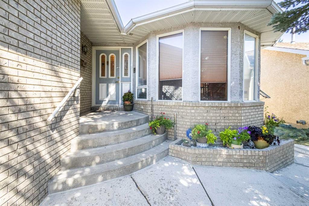 125 Edgebrook Road Nw, Calgary, AB - Outdoor With Deck Patio Veranda