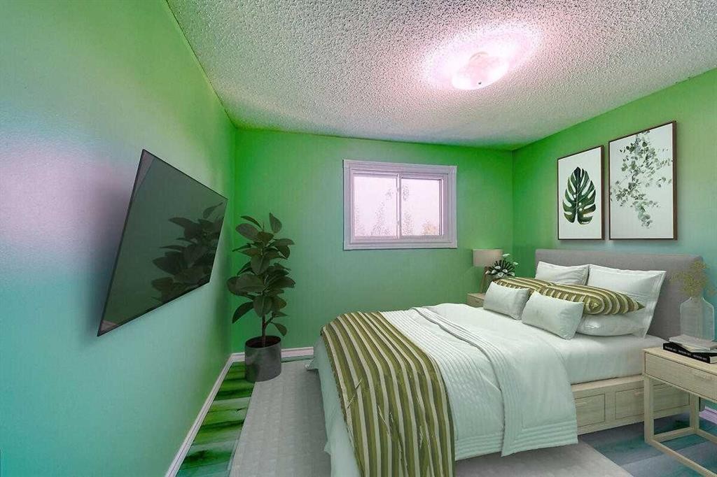 206-2200 Woodview Drive Sw, Calgary, AB - Indoor Photo Showing Bedroom