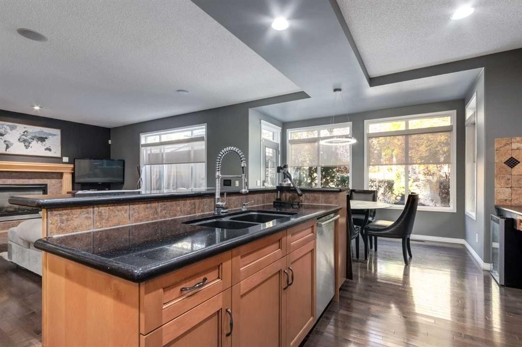 10 Chapala Road Se, Calgary, AB - Indoor Photo Showing Kitchen With Double Sink