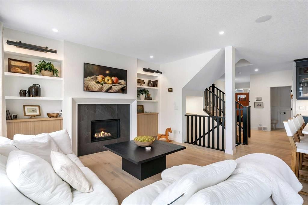 1176 Cranbrook Gardens Se, Calgary, AB - Indoor Photo Showing Living Room With Fireplace