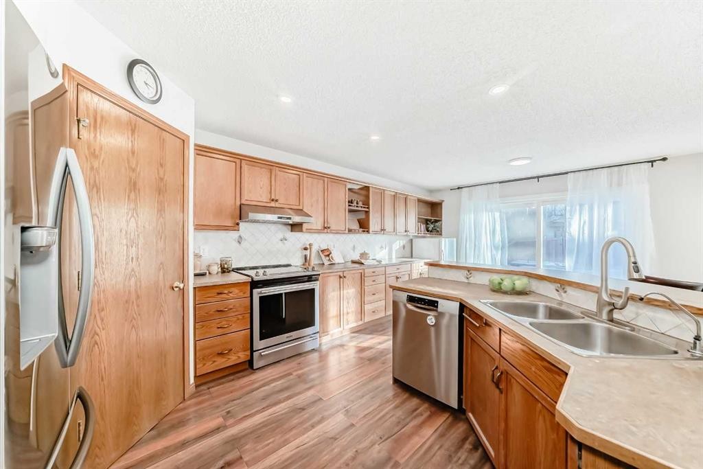 205 Patterson Hill Sw, Calgary, AB - Indoor Photo Showing Kitchen With Stainless Steel Kitchen With Double Sink