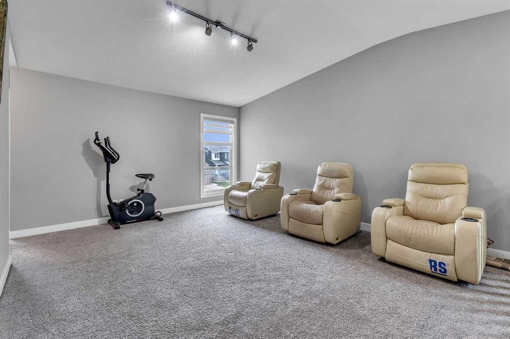 225 Cornerstone Manor Ne, Calgary, AB - Indoor Photo Showing Gym Room