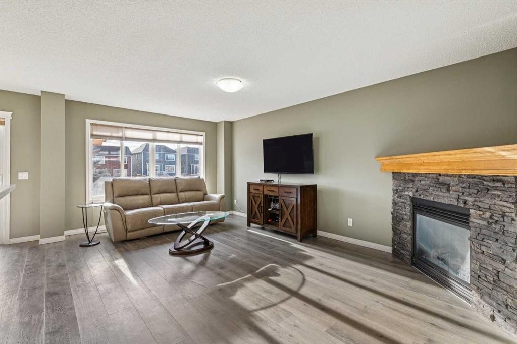 460 Silverado Plains Circle Sw, Calgary, AB - Indoor Photo Showing Living Room With Fireplace