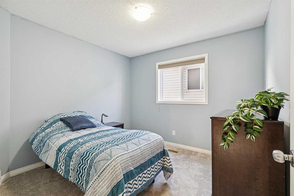 460 Silverado Plains Circle Sw, Calgary, AB - Indoor Photo Showing Bedroom