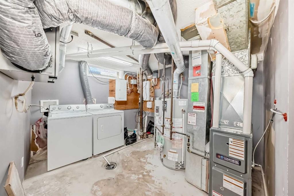 611 Meota Road Ne, Calgary, AB - Indoor Photo Showing Laundry Room