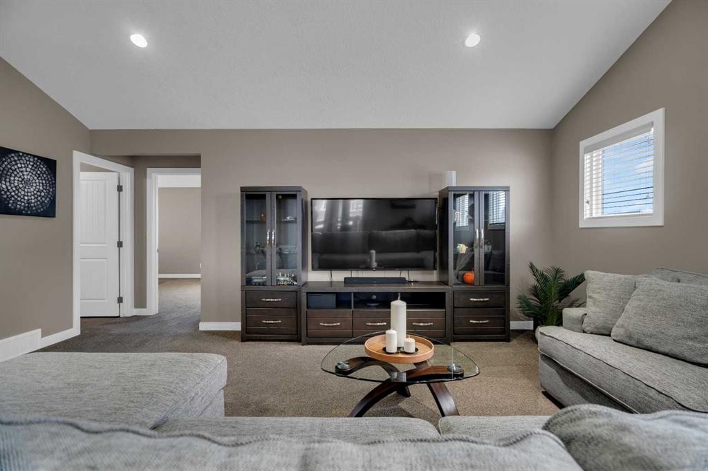 300 Aspenmere Way, Chestermere, AB - Indoor Photo Showing Living Room