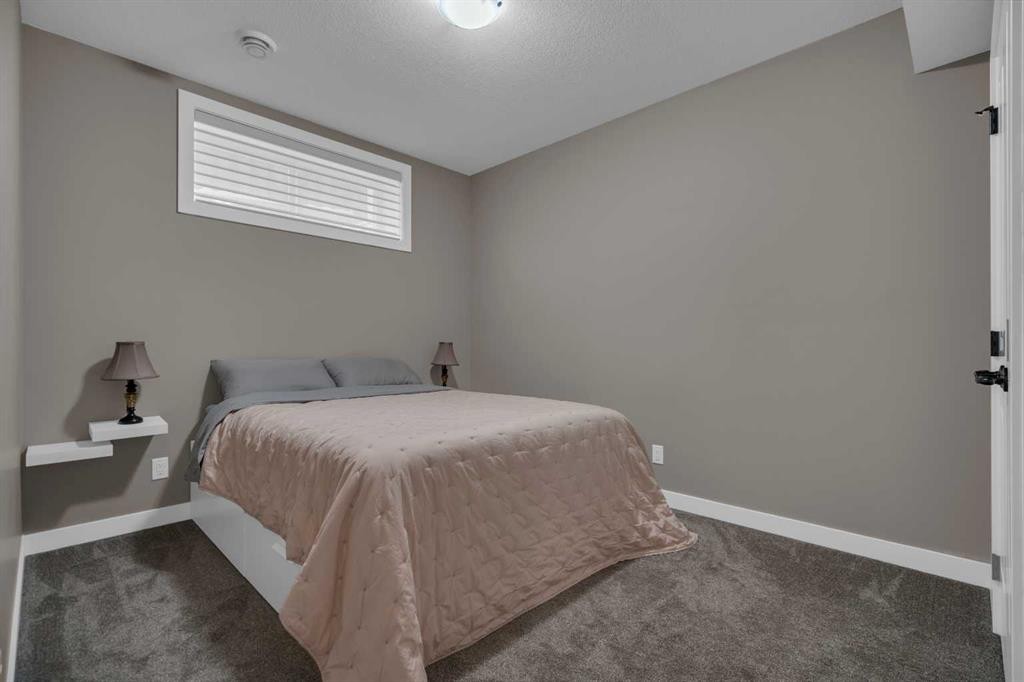 300 Aspenmere Way, Chestermere, AB - Indoor Photo Showing Bedroom