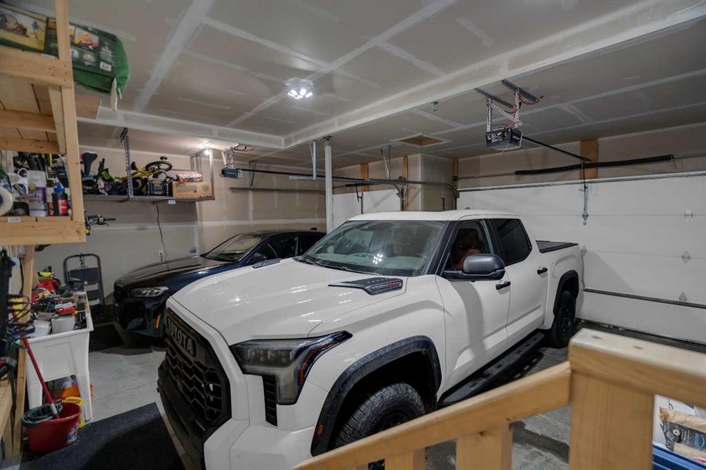 300 Aspenmere Way, Chestermere, AB - Indoor Photo Showing Garage