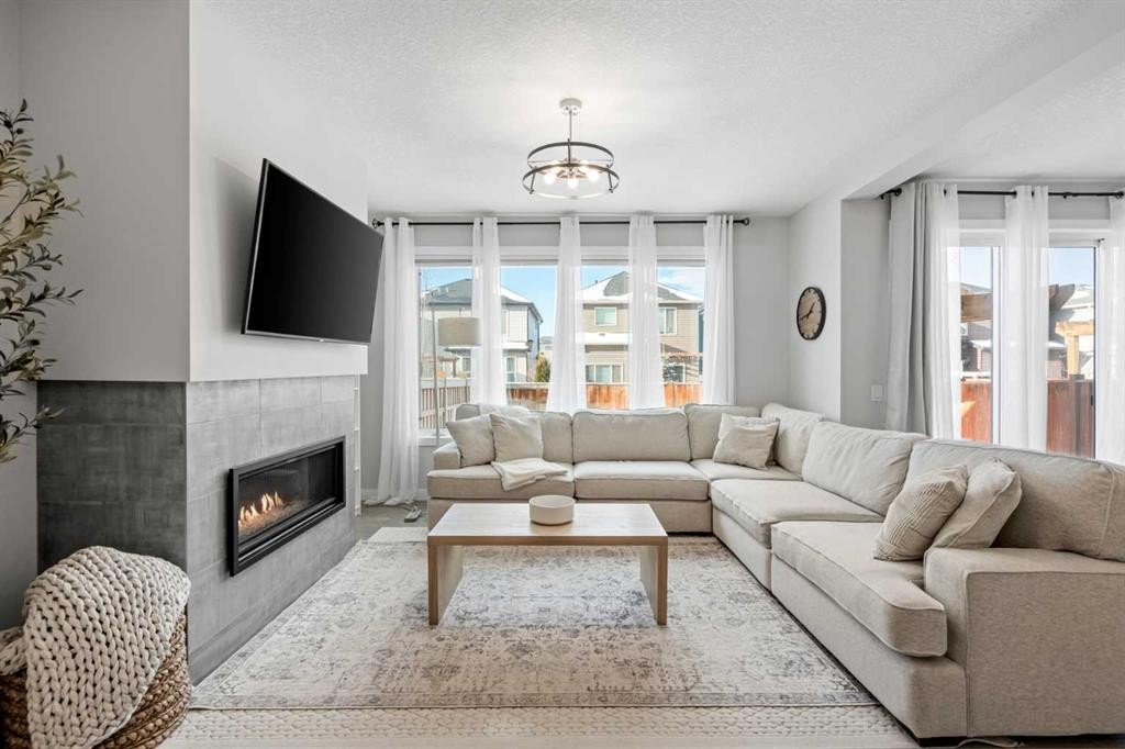 86 Legacy Woods Place Se, Calgary, AB - Indoor Photo Showing Living Room With Fireplace