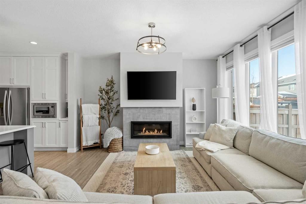 86 Legacy Woods Place Se, Calgary, AB - Indoor Photo Showing Living Room With Fireplace
