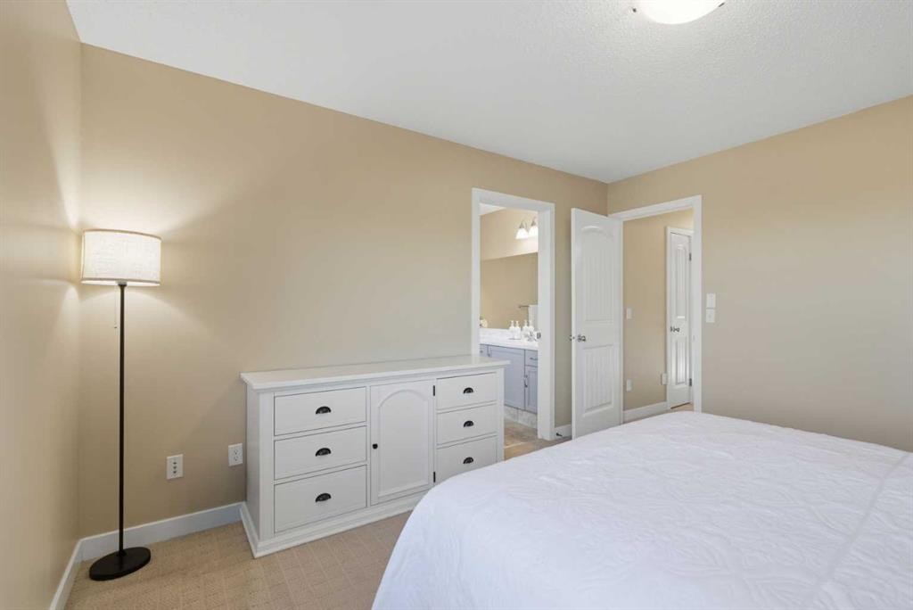 227 Panamount Circle Nw, Calgary, AB - Indoor Photo Showing Bedroom