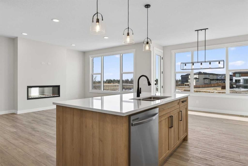 298 Kinniburgh Loop, Chestermere, AB - Indoor Photo Showing Kitchen With Double Sink With Upgraded Kitchen