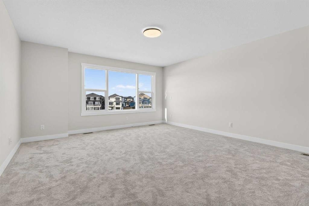 298 Kinniburgh Loop, Chestermere, AB - Indoor Photo Showing Other Room