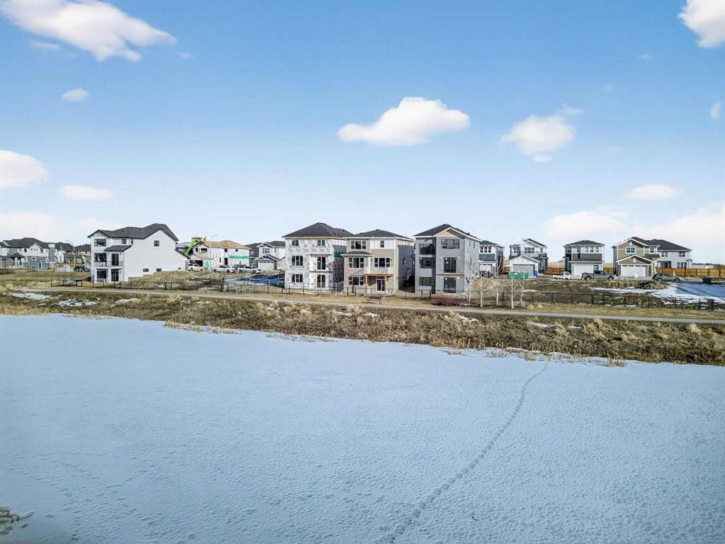 298 Kinniburgh Loop, Chestermere, AB - Outdoor With Body Of Water With View