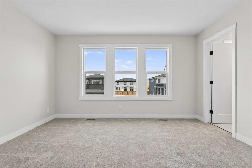 298 Kinniburgh Loop, Chestermere, AB - Indoor Photo Showing Other Room