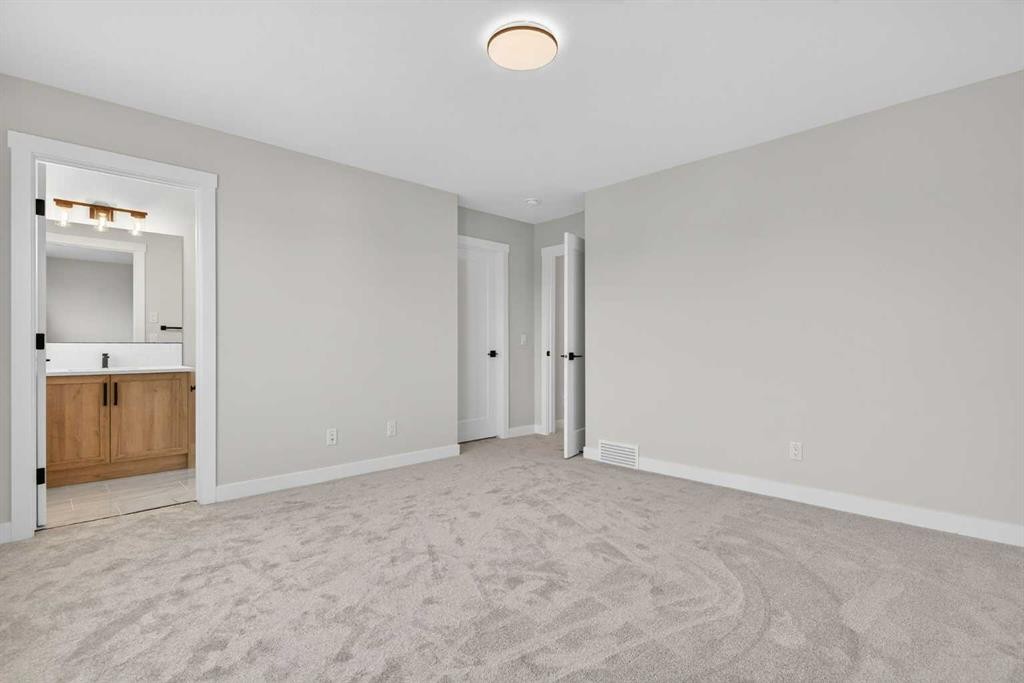 298 Kinniburgh Loop, Chestermere, AB - Indoor Photo Showing Other Room