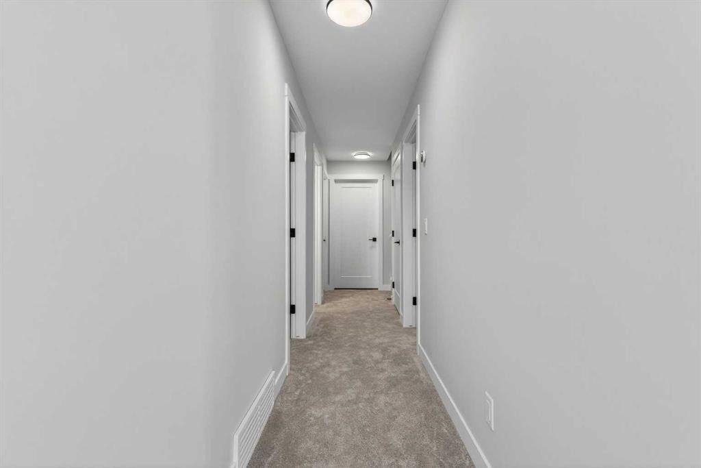 298 Kinniburgh Loop, Chestermere, AB - Indoor Photo Showing Other Room