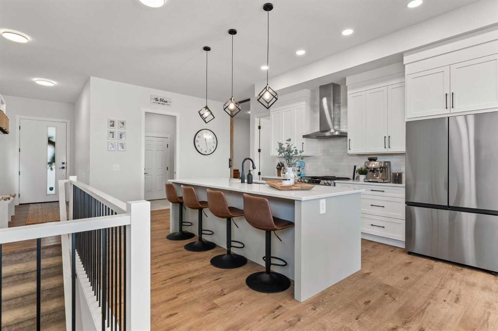 79 Sandpiper Bend, Chestermere, AB - Indoor Photo Showing Kitchen With Upgraded Kitchen