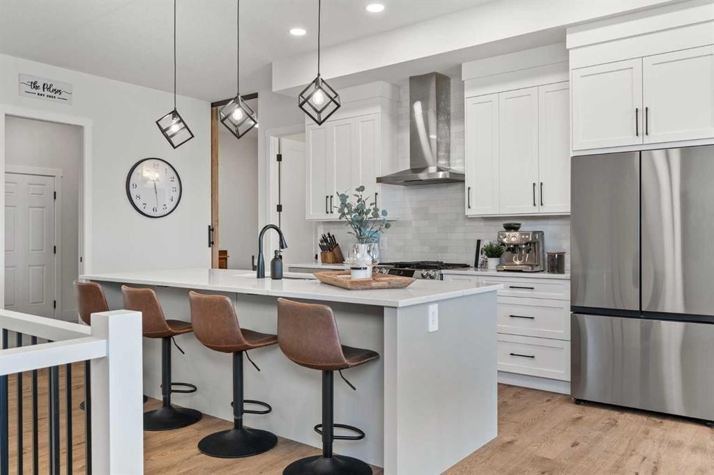 79 Sandpiper Bend, Chestermere, AB - Indoor Photo Showing Kitchen With Upgraded Kitchen