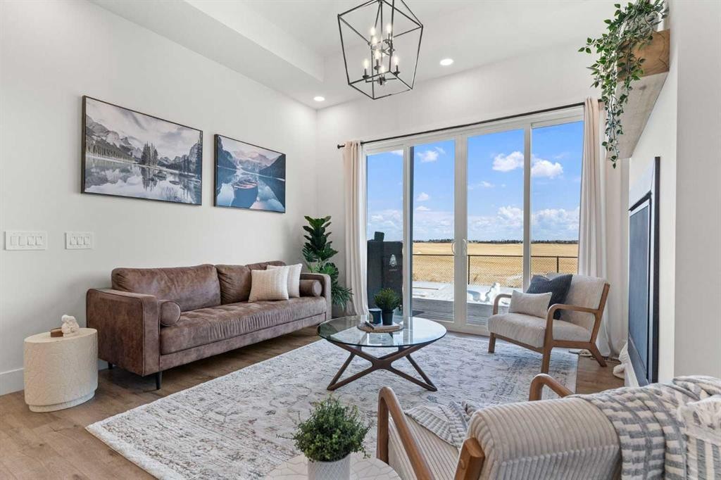 79 Sandpiper Bend, Chestermere, AB - Indoor Photo Showing Living Room