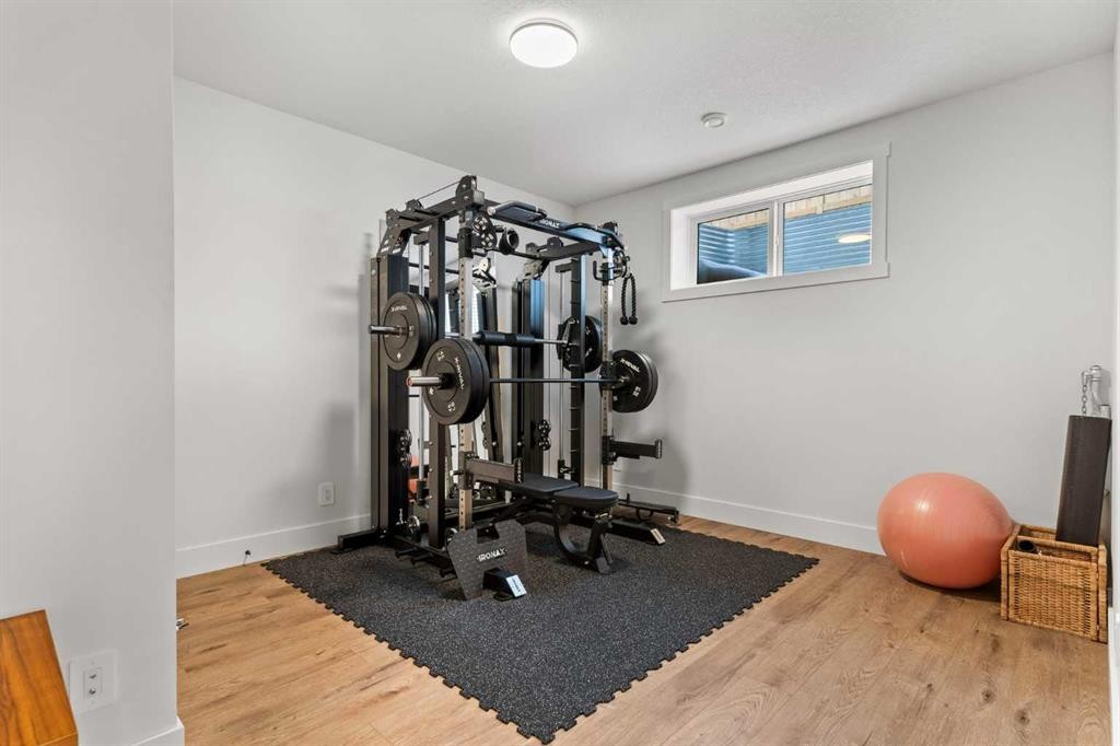 79 Sandpiper Bend, Chestermere, AB - Indoor Photo Showing Gym Room