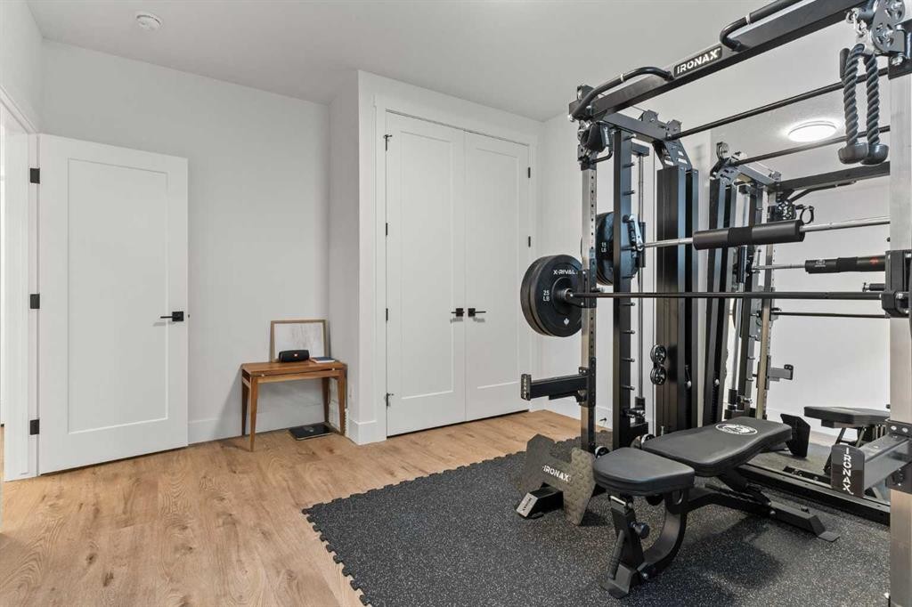 79 Sandpiper Bend, Chestermere, AB - Indoor Photo Showing Gym Room