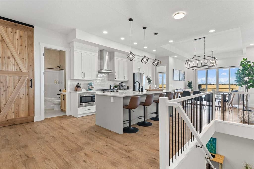 79 Sandpiper Bend, Chestermere, AB - Indoor Photo Showing Kitchen With Upgraded Kitchen