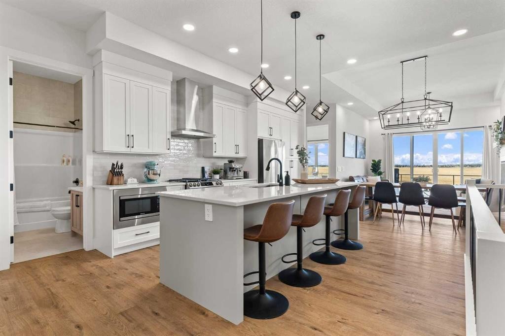 79 Sandpiper Bend, Chestermere, AB - Indoor Photo Showing Kitchen With Upgraded Kitchen