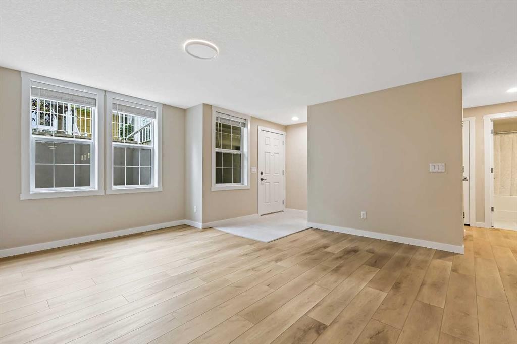147 Mckenzie Towne Close Se, Calgary, AB - Indoor Photo Showing Other Room