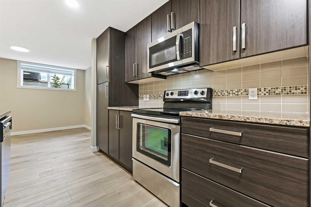 147 Mckenzie Towne Close Se, Calgary, AB - Indoor Photo Showing Kitchen With Stainless Steel Kitchen