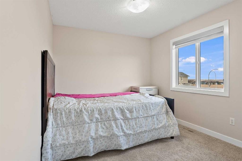 320 Nolancrest Circle Nw, Calgary, AB - Indoor Photo Showing Bedroom
