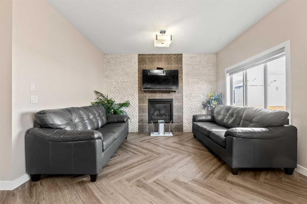 320 Nolancrest Circle Nw, Calgary, AB - Indoor Photo Showing Living Room With Fireplace