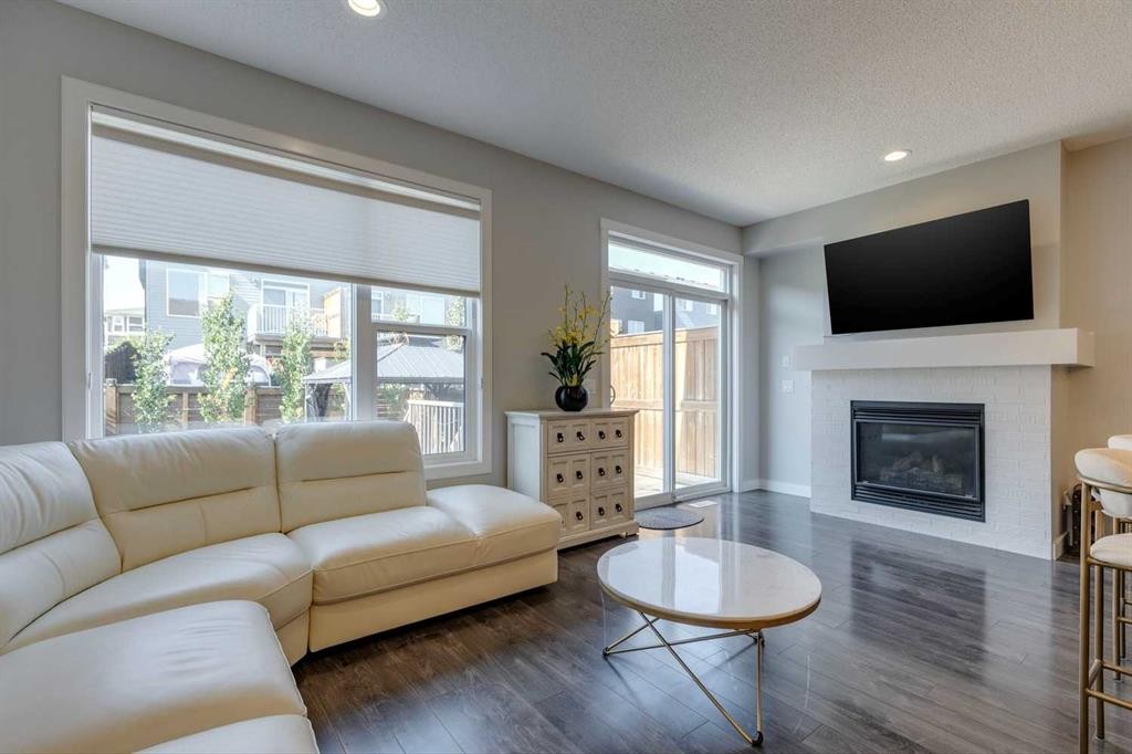 55 Sage Bluff Heights Nw, Calgary, AB - Indoor Photo Showing Living Room With Fireplace