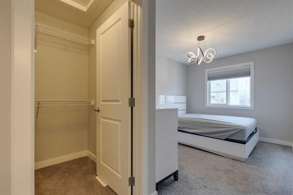 55 Sage Bluff Heights Nw, Calgary, AB - Indoor Photo Showing Bedroom