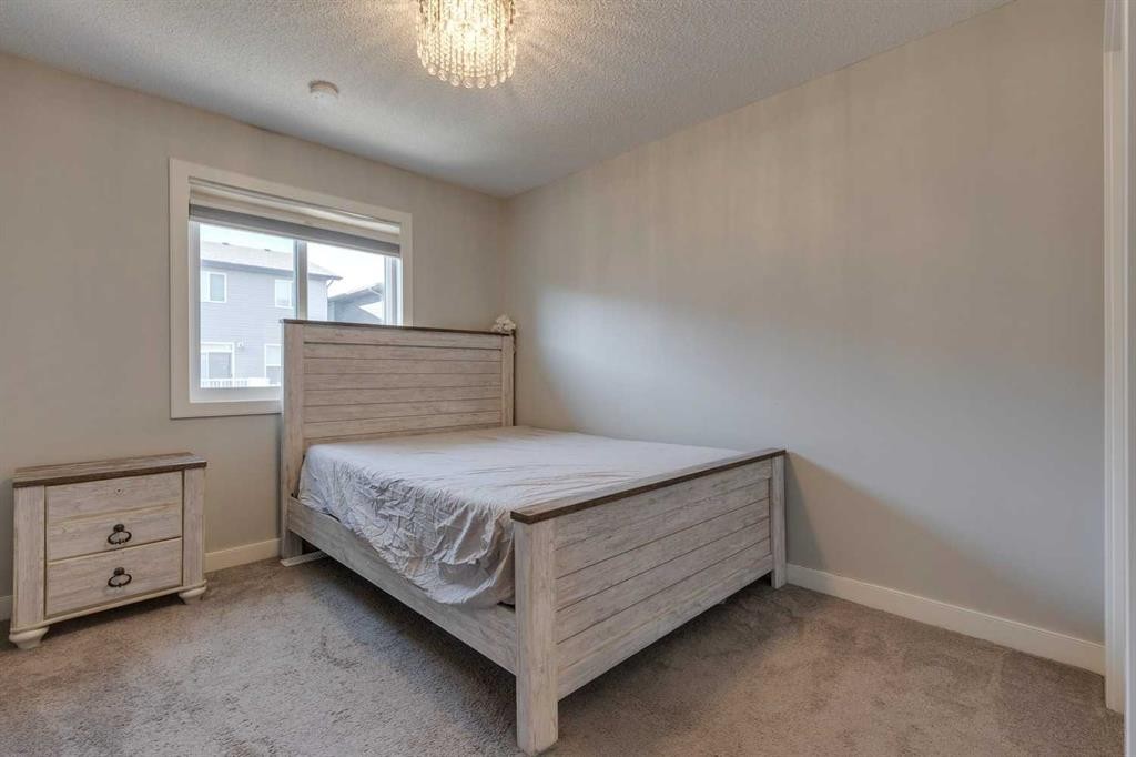 55 Sage Bluff Heights Nw, Calgary, AB - Indoor Photo Showing Bedroom
