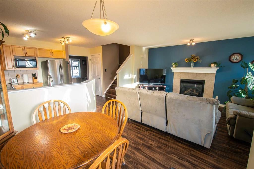 11 Saddlebrook Mews Ne, Calgary, AB - Indoor With Fireplace