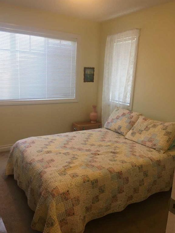1100 Bayview Gardens Sw, Airdrie, AB - Indoor Photo Showing Bedroom