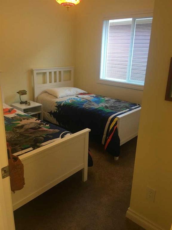 1100 Bayview Gardens Sw, Airdrie, AB - Indoor Photo Showing Bedroom