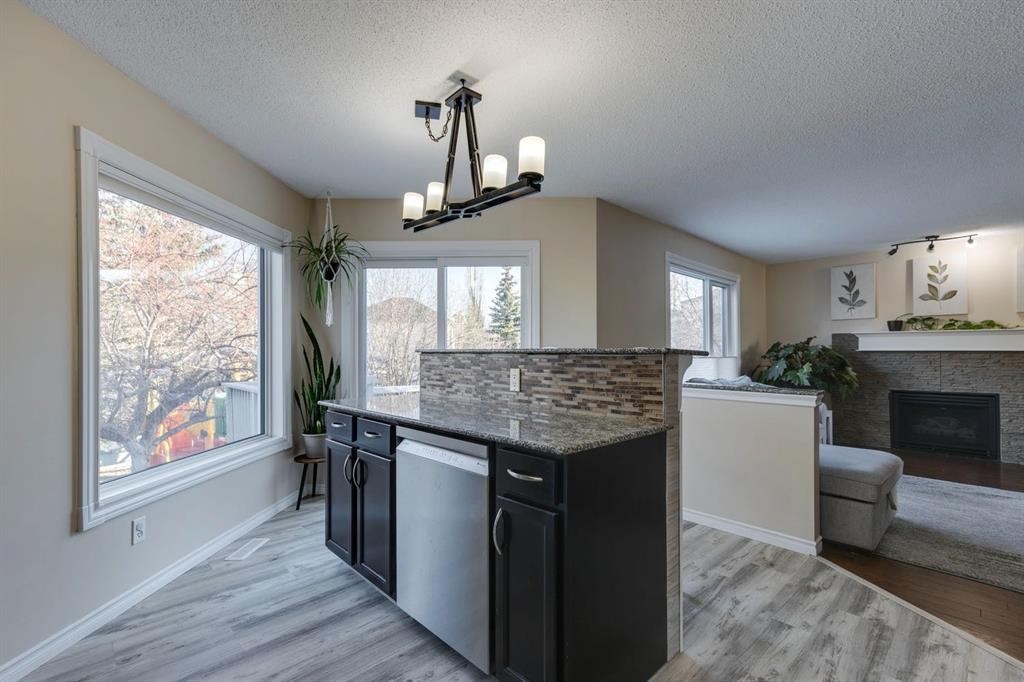 22 Hidden Spring Court Nw, Calgary, AB - Indoor With Fireplace