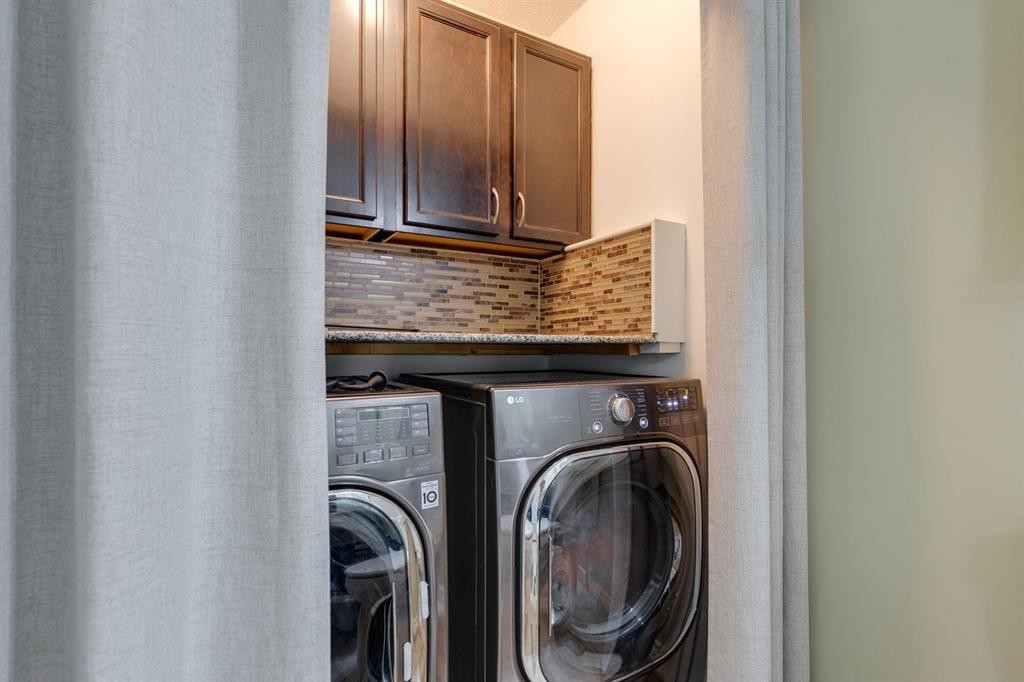 22 Hidden Spring Court Nw, Calgary, AB - Indoor Photo Showing Laundry Room