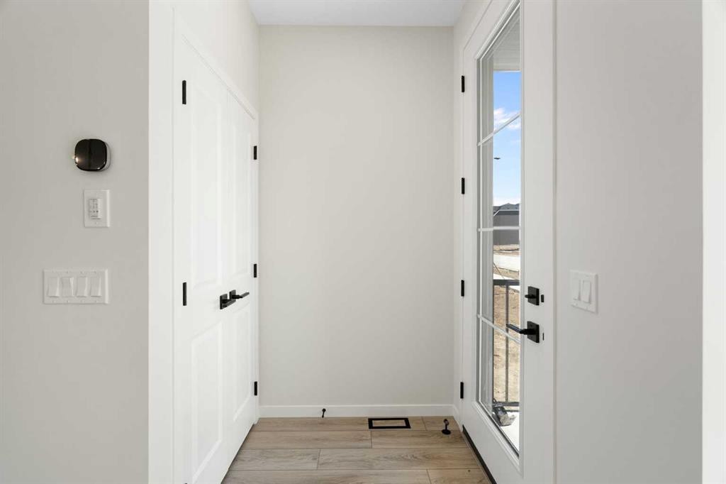 75 Bluerock Terrace Sw, Calgary, AB - Indoor Photo Showing Other Room